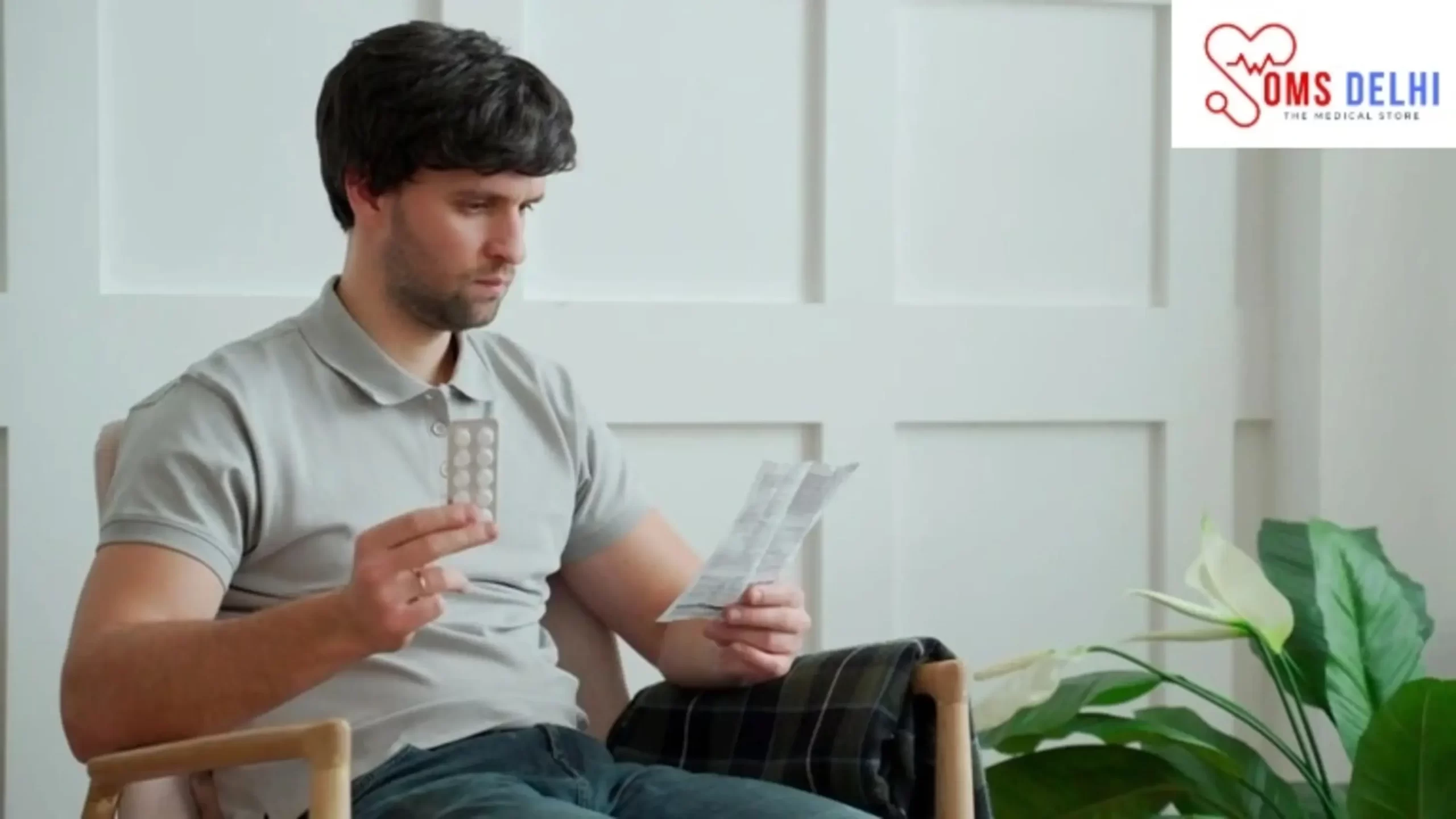 Man reading delay spray instructions to understand delay spray side effects, safety precautions, and proper usage for premature ejaculation.